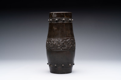 A Chinese archaistic bronze vase and a tripod censer, Yuan