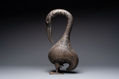A large Qajar damascened steel bird-form sculpture, Persia, 19th C.