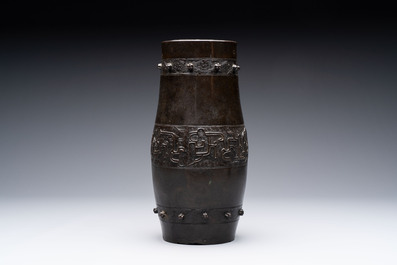 A Chinese archaistic bronze vase and a tripod censer, Yuan