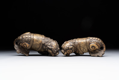A pair of Chinese bronze Buddhist lions, 19/20th C.