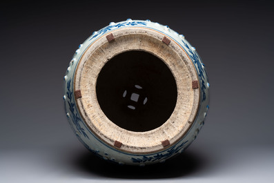 A Chinese blue and white 'birds among flowering branches' garden seat, 19th C.