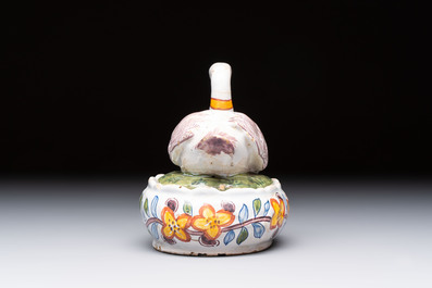 A polychrome Dutch Delft model of a duck and a swan, 19th C.