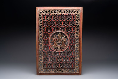 Seven Chinese gilt-lacquered carved wooden panels with narrative design, 19th C.