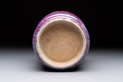 A Chinese flamb&eacute;-glazed cylindrical jardini&egrave;re and two celadon-glazed vases, 19th C.