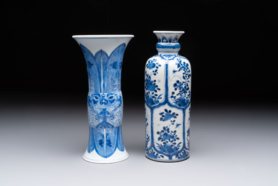 Three Chinese blue and white vases, one with wooden cover, Kangxi