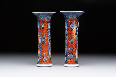 A Chinese famille rose garniture of five 'mandarin subject' vases, Qianlong