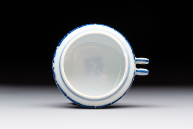 A fine Chinese archaistic blue and white bird feeder with chilong design, Qianlong mark and of the period