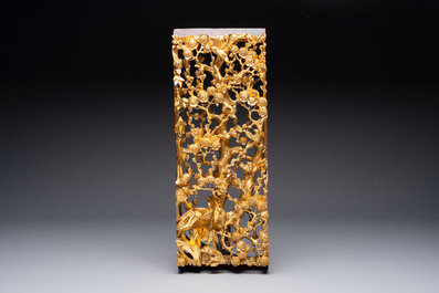 Seven Chinese gilt-lacquered carved wooden panels with narrative design, 19th C.