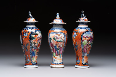 A Chinese famille rose garniture of five 'mandarin subject' vases, Qianlong