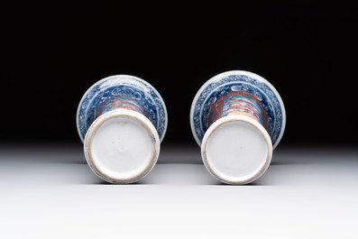 A Chinese famille rose garniture of five 'mandarin subject' vases, Qianlong