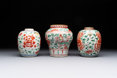 Five Chinese wucai 'Buddhist lion' and 'peony scroll' jars, Transitional period