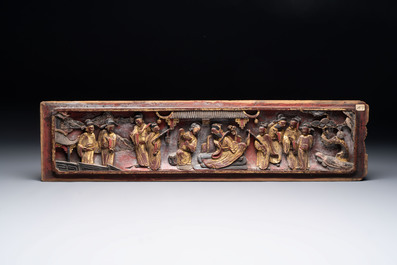 Seven Chinese gilt-lacquered carved wooden panels with narrative design, 19th C.