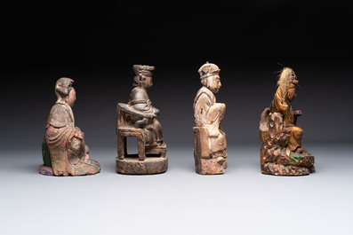 Eight various Chinese lacquered wooden figures, 19th C.