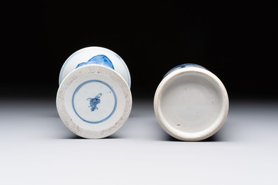 Three Chinese blue and white vases, one with wooden cover, Kangxi