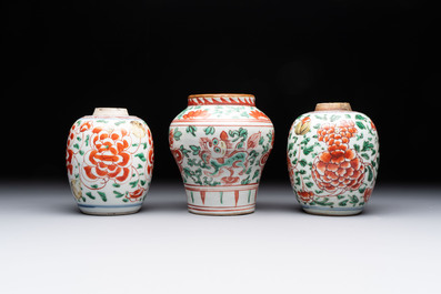 Five Chinese wucai 'Buddhist lion' and 'peony scroll' jars, Transitional period