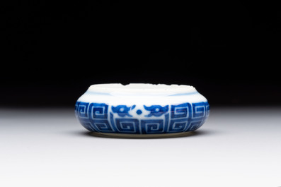 A fine Chinese archaistic blue and white bird feeder with chilong design, Qianlong mark and of the period