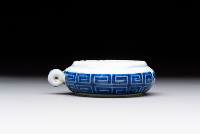 A fine Chinese archaistic blue and white bird feeder with chilong design, Qianlong mark and of the period