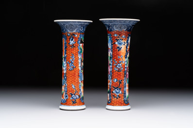 A Chinese famille rose garniture of five 'mandarin subject' vases, Qianlong