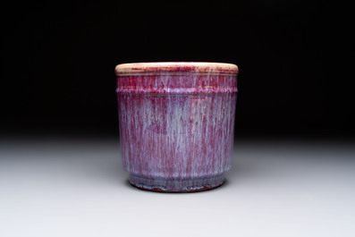 A Chinese flamb&eacute;-glazed cylindrical jardini&egrave;re and two celadon-glazed vases, 19th C.