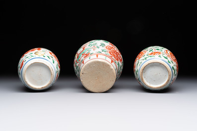 Five Chinese wucai 'Buddhist lion' and 'peony scroll' jars, Transitional period