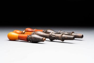 An Ottoman white-metal and Tophane pottery-mounted cut-crystal hookah, with three hose tubes and three amber-mounted mouthpieces, Turkey, 19th C.