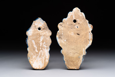 Two blue and white Dutch Delft holy water fonts, 17th C.