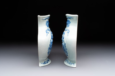 A pair of Chinese blue and white celadon-ground 'Buddhist lions' wall pocket vases, Yongzheng mark, 19/20th C.