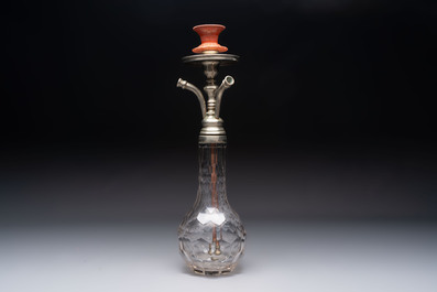 An Ottoman white-metal and Tophane pottery-mounted cut-crystal hookah, with three hose tubes and three amber-mounted mouthpieces, Turkey, 19th C.
