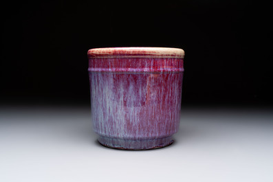 A Chinese flamb&eacute;-glazed cylindrical jardini&egrave;re and two celadon-glazed vases, 19th C.