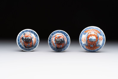 A Chinese famille rose garniture of five 'mandarin subject' vases, Qianlong