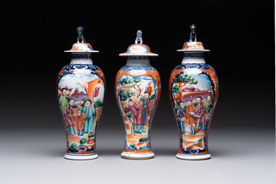 A Chinese famille rose garniture of five 'mandarin subject' vases, Qianlong