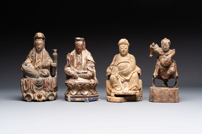 Eight various Chinese lacquered wooden figures, 19th C.