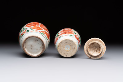 Five Chinese wucai 'Buddhist lion' and 'peony scroll' jars, Transitional period