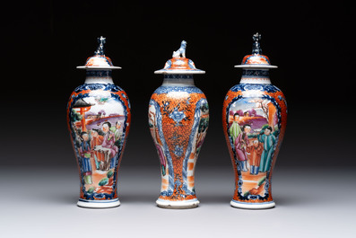 A Chinese famille rose garniture of five 'mandarin subject' vases, Qianlong