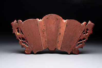 Seven Chinese gilt-lacquered carved wooden panels with narrative design, 19th C.