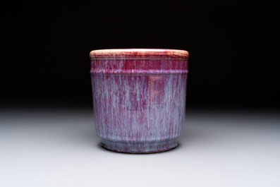 A Chinese flamb&eacute;-glazed cylindrical jardini&egrave;re and two celadon-glazed vases, 19th C.