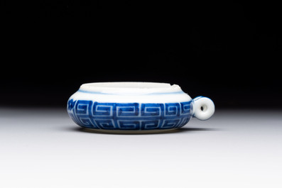 A fine Chinese archaistic blue and white bird feeder with chilong design, Qianlong mark and of the period