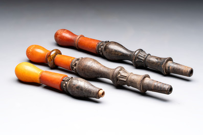 An Ottoman white-metal and Tophane pottery-mounted cut-crystal hookah, with three hose tubes and three amber-mounted mouthpieces, Turkey, 19th C.