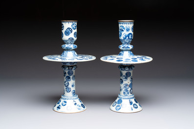 A pair of Chinese blue and white two-piece candle stick holders with brocade ball design for the Southeast Asian market, 19th C.