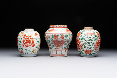 Five Chinese wucai 'Buddhist lion' and 'peony scroll' jars, Transitional period