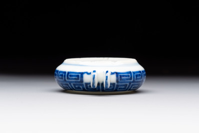 A fine Chinese archaistic blue and white bird feeder with chilong design, Qianlong mark and of the period