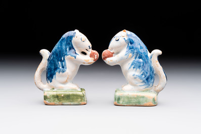A pair of polychrome Dutch Delft miniature models of squirrels, a duck and a swan, 18th C.