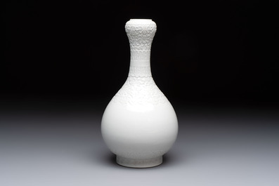 A Chinese white-glazed garlic-head vase and a robin&rsquo;s egg-glazed vase, Qianlong mark, 20th C.