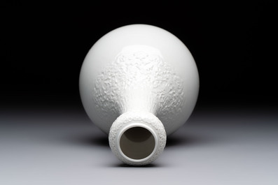 A Chinese white-glazed garlic-head vase and a robin&rsquo;s egg-glazed vase, Qianlong mark, 20th C.