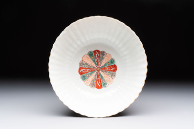 A Chinese famille verte bowl and saucer with floral design, Kangxi