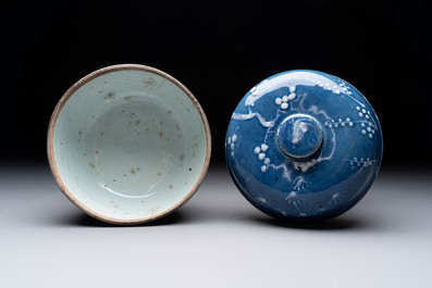 A rare Chinese Swatow white slip-decorated blue-ground bowl and cover, Ming