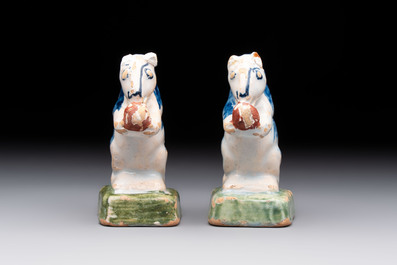 A pair of polychrome Dutch Delft miniature models of squirrels, a duck and a swan, 18th C.