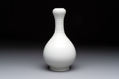 A Chinese white-glazed garlic-head vase and a robin&rsquo;s egg-glazed vase, Qianlong mark, 20th C.
