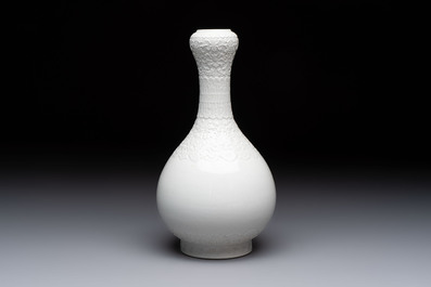 A Chinese white-glazed garlic-head vase and a robin&rsquo;s egg-glazed vase, Qianlong mark, 20th C.