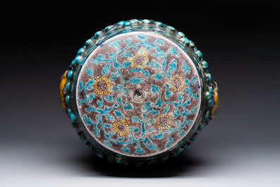 A Chinese Fahua barrel-shaped 'lotus scroll' stool with incised design, Ming
